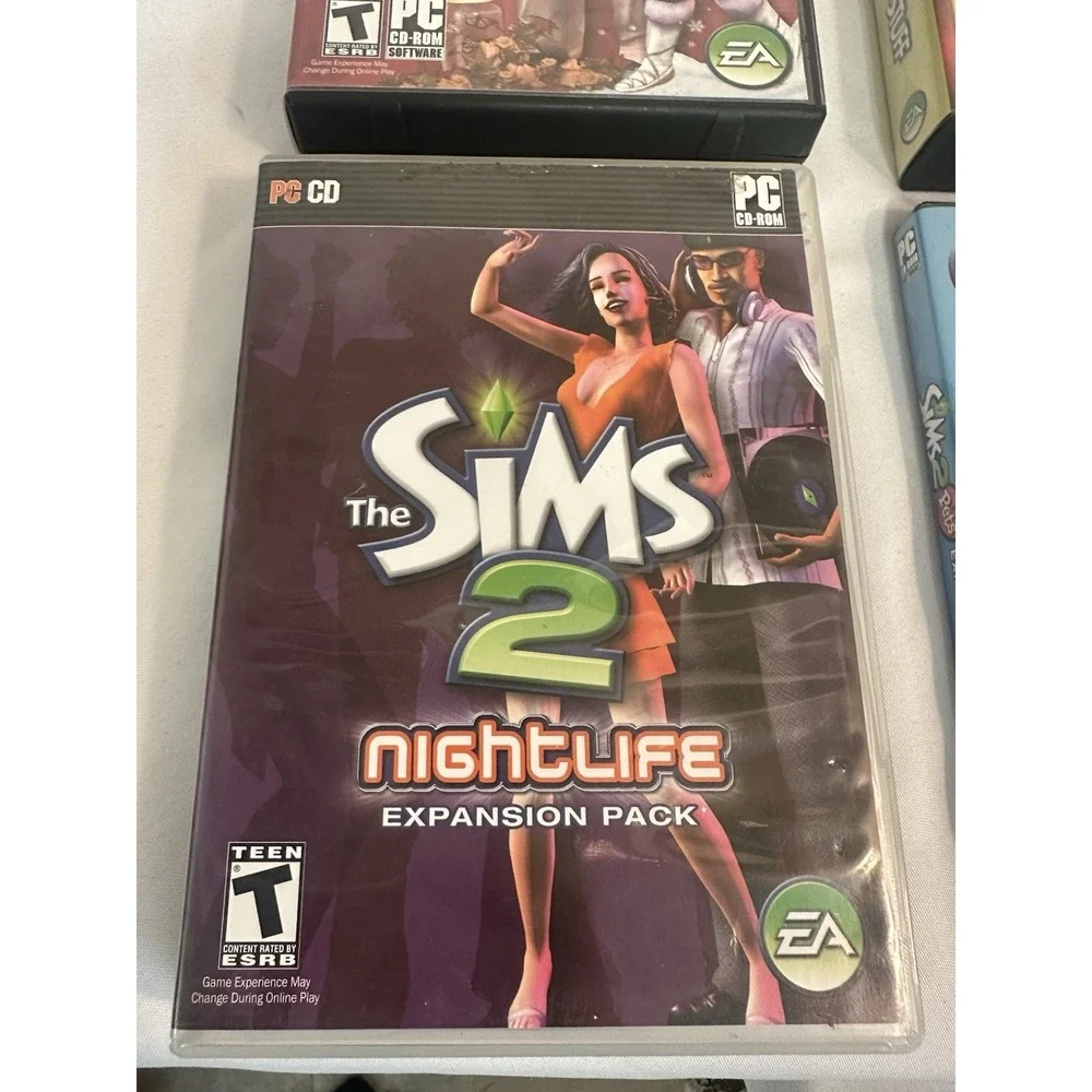 The Sims 2 PC 4 Expansion Packs Bundle Seasons Nightlife Pets H&M Fashion Stuff